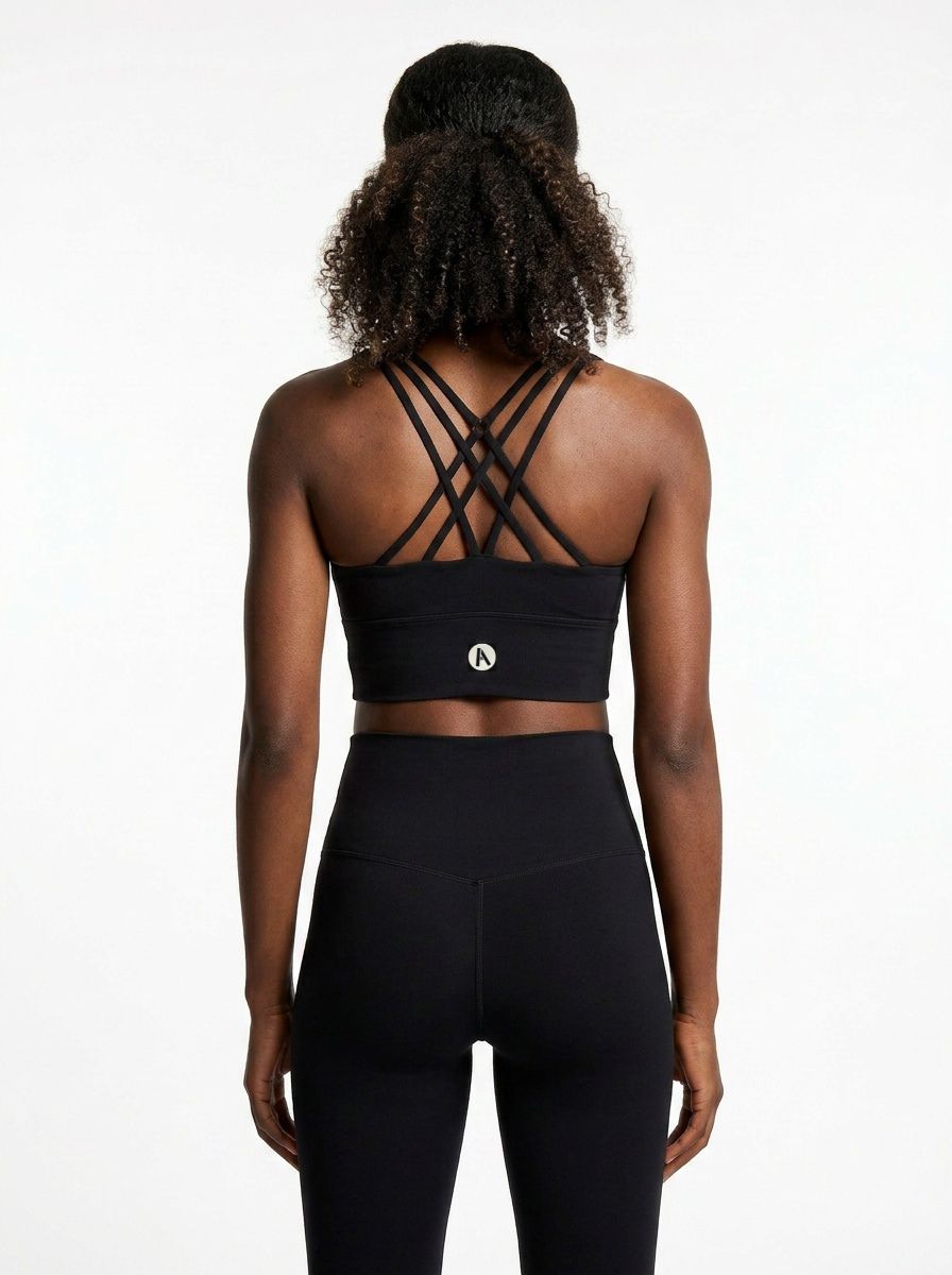 Black racerback sports bra back view with stretch support design
