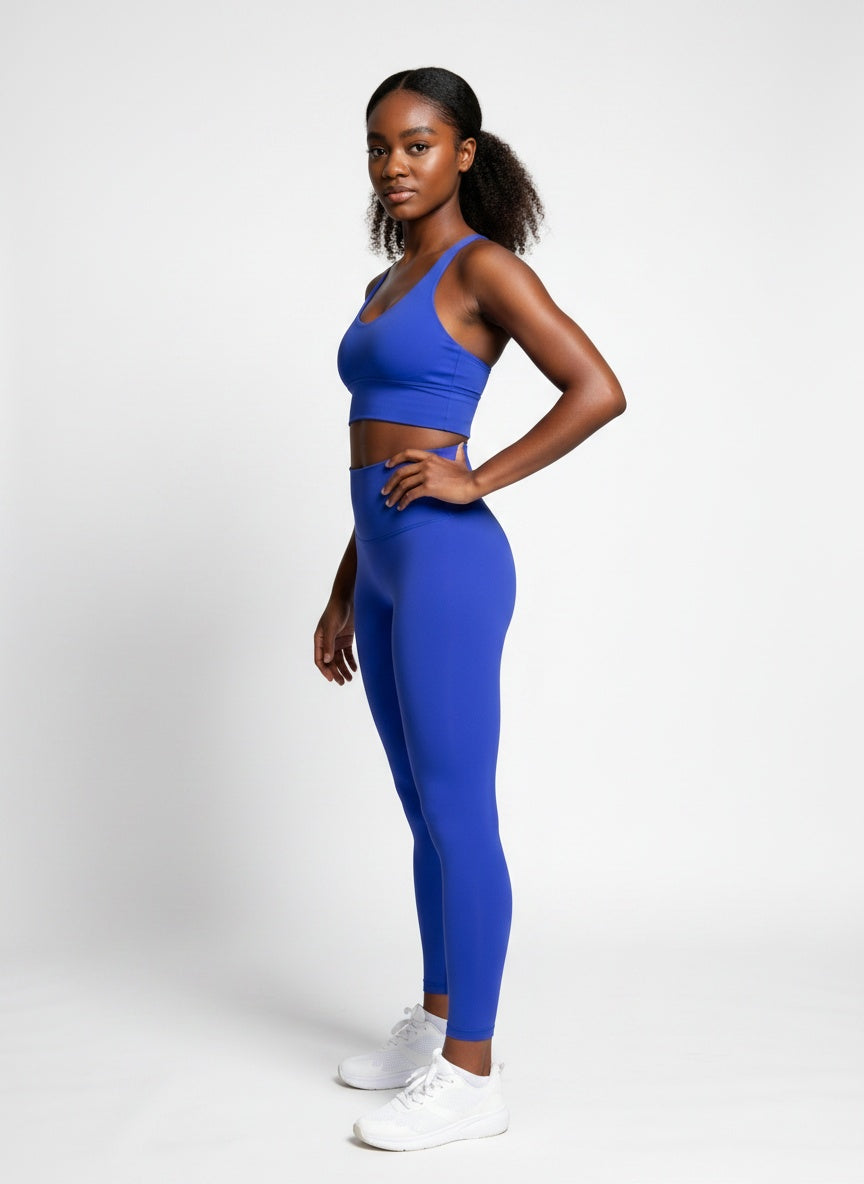 Blue sculpting leggings side view for running and Pilates workouts

