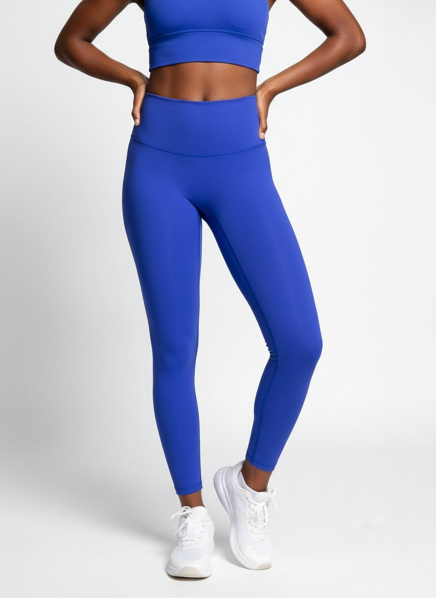 Woman wearing blue athletic leggings for casual everyday streetwear