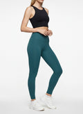 Green sculpting leggings side view for running and Pilates workouts
